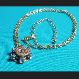Gold bullet casing necklace